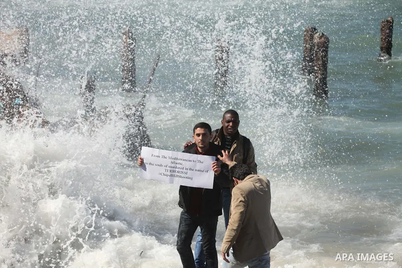 Palestinians gather to remember the Chapel Hill shooting victims, the three young Muslims who were gunned down in North Carolina this week, in Gaza City, February 14, 2015. Newlywed Deah Shaddy Barakat, 23, a University...