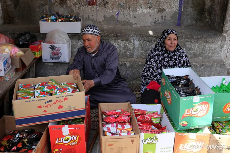 Palestinians display goods outside their house in Rafah in the southern Gaza strip, on February 14, 2015. Refugee unemployment in Gaza reached 45.5% in the second quarter of 2014, the highest level ever reported in UNRWA...