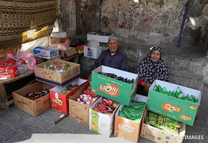 Palestinians display goods outside their house in Rafah in the southern Gaza strip, on February 14, 2015. Refugee unemployment in Gaza reached 45.5% in the second quarter of 2014, the highest level ever reported in UNRWA...