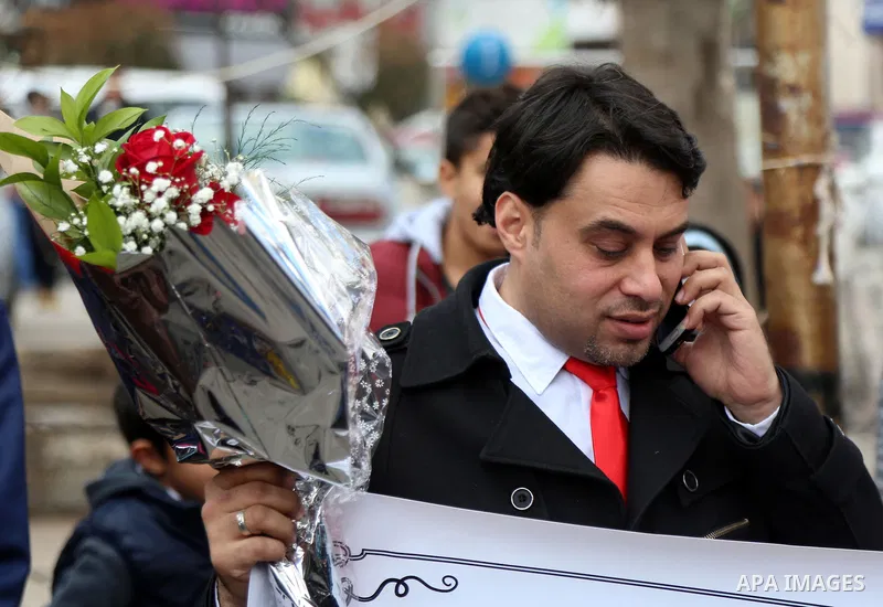 A Palestinian Rashid fedda, 35,speaks to media to demand the President Mahmoud Abbas for help him in reuniting with his fiancee, Dalia from Gaza City, during a protest, at Manara square in the West Bank town of Ramallah,...