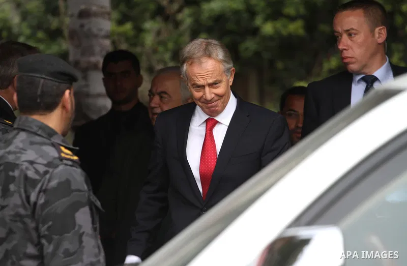 Middle East Quartet envoy Tony Blair leaves after a meeting with Palestinian unity government ministers in Gaza city on February 15, 2015. Blair is in Gaza for meetings with officials about the reconstruction of the terr...