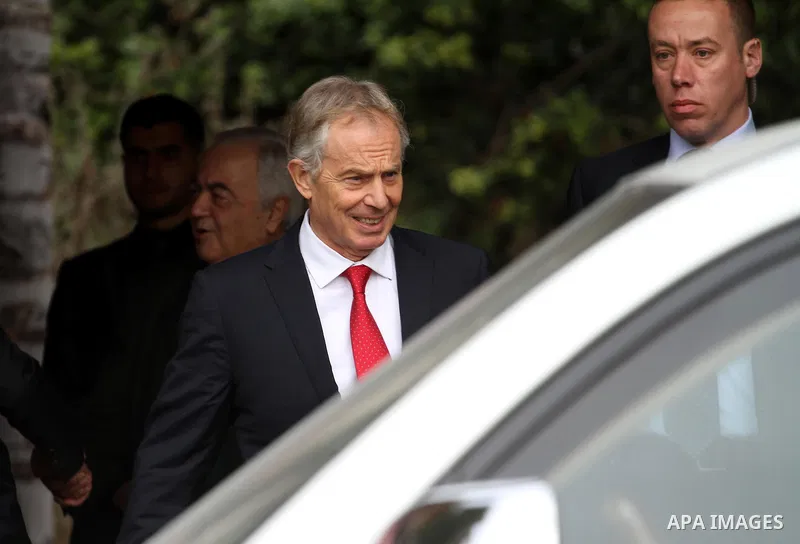 Middle East Quartet envoy Tony Blair leaves after a meeting with Palestinian unity government ministers in Gaza city on February 15, 2015. Blair is in Gaza for meetings with officials about the reconstruction of the terr...