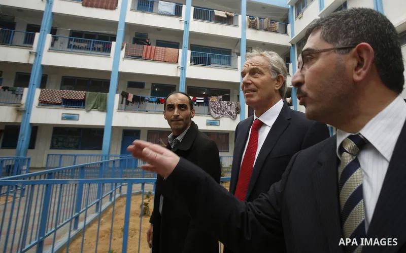 Quartet Representative to the Middle East and former British Prime Minister, Tony Blair, visits a UN-run school sheltering Palestinians, whose houses were destroyed by what they said was Israeli shelling during a 50-day...