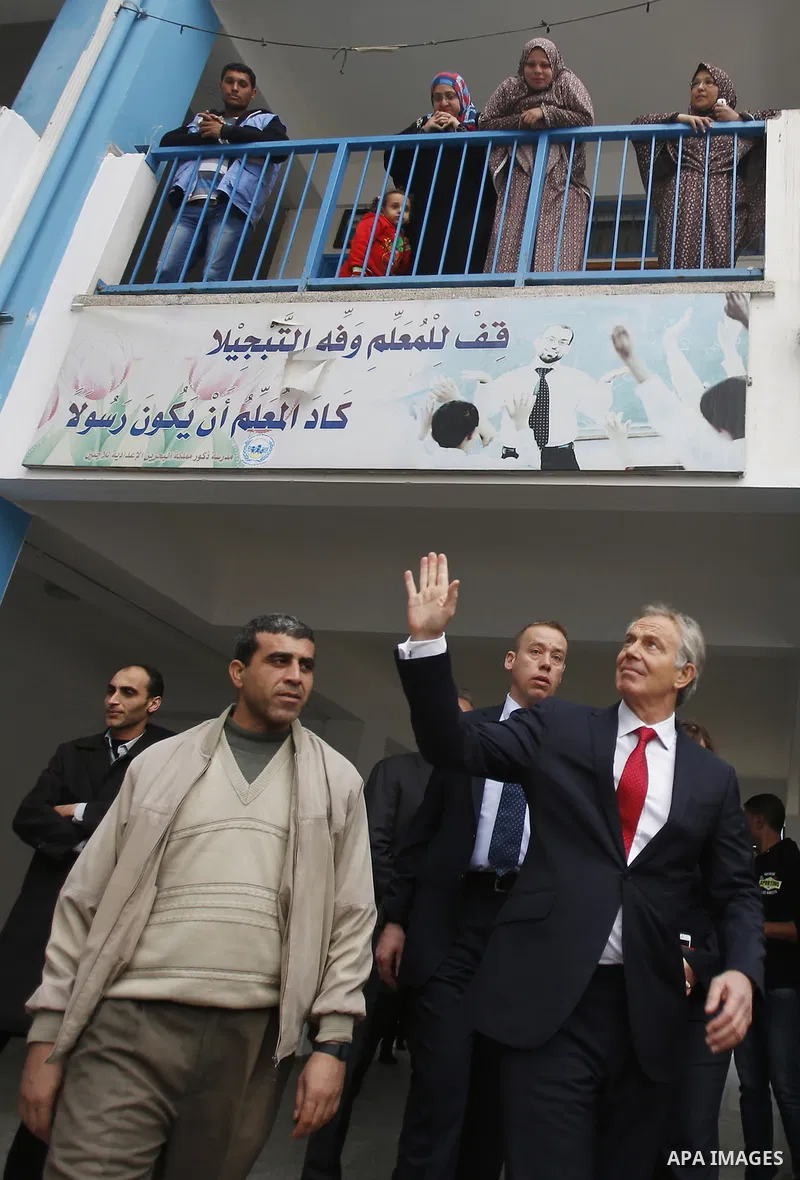 Quartet Representative to the Middle East and former British Prime Minister, Tony Blair, visits a UN-run school sheltering Palestinians, whose houses were destroyed by what they said was Israeli shelling during a 50-day...