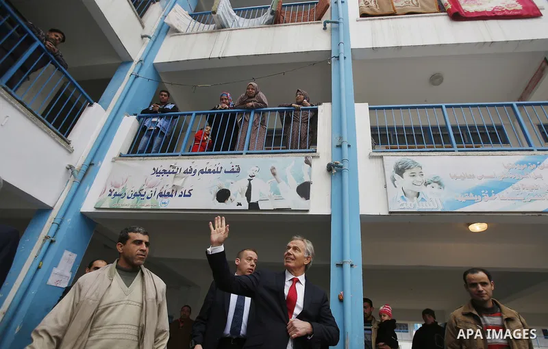 Quartet Representative to the Middle East and former British Prime Minister, Tony Blair, visits a UN-run school sheltering Palestinians, whose houses were destroyed by what they said was Israeli shelling during a 50-day...
