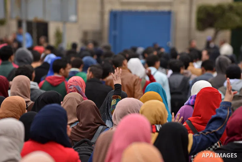 Egyptian students who are support ousted President Mohamed Morsi and the Muslim Brotherhood take part in a protest in Cairo University on February 15, 2015. Due to the escalation of students protest in the campus of seve...