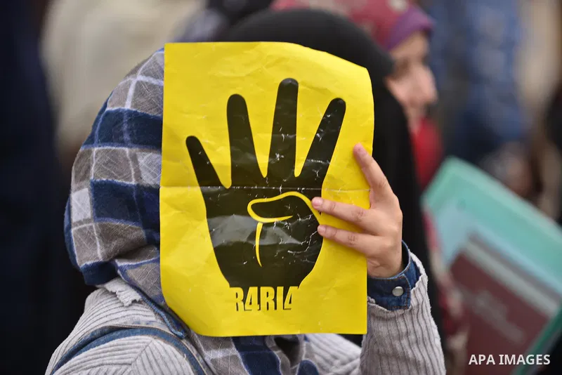 Egyptian students who are support ousted President Mohamed Morsi and the Muslim Brotherhood take part in a protest in Cairo University on February 15, 2015. Due to the escalation of students protest in the campus of seve...