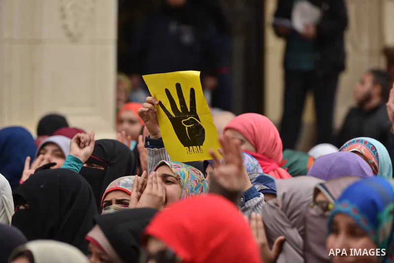 Egyptian students who are support ousted President Mohamed Morsi and the Muslim Brotherhood take part in a protest in Cairo University on February 15, 2015. Due to the escalation of students protest in the campus of seve...