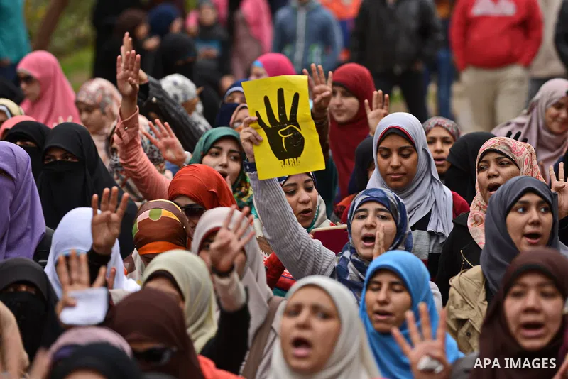 Egyptian students who are support ousted President Mohamed Morsi and the Muslim Brotherhood take part in a protest in Cairo University on February 15, 2015. Due to the escalation of students protest in the campus of seve...