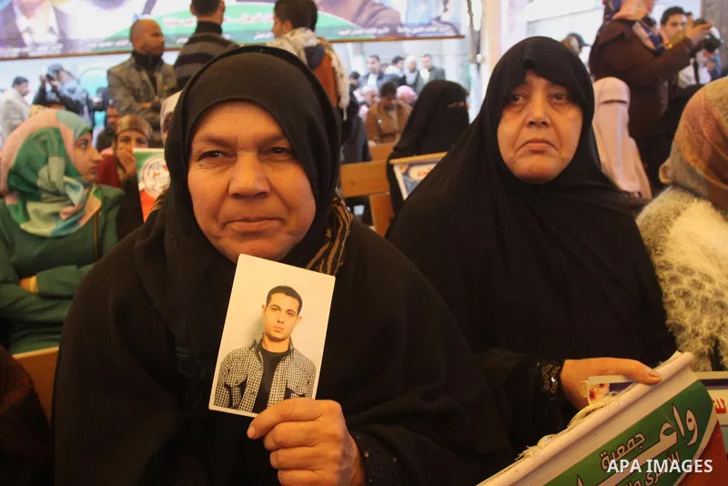 Palestinians take part a protest demanding the release of their relatives prisoners held in Israeli jails, in front of the Red Cross office in Gaza City, on February 16, 2015. Photo by Mohammed Asad