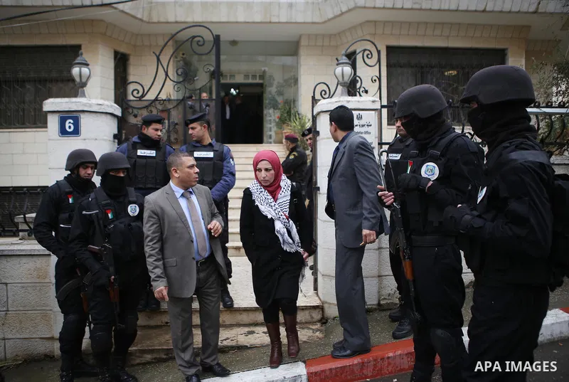 Palestinians take part in a protest against the murders of the Twenty-one Egyptians beheaded in Libya by the Islamic State (IS), in the West Bank city of Ramallah, on February 16, 2015. Islamic State released the video o...