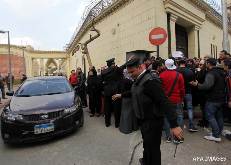 Egyptian protesters take part in a demonstration to denounce the killing of Egyptian Christians in Libya, outside the Coptic Cathedral of Saint Marcos, in Cairo, Egypt, 16 February 2015. An Islamic State video released o...
