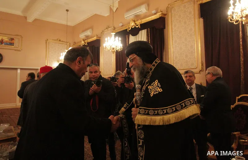 Egypt's Coptic Pope Tawadros II recieves condolences at Saint-Mark's Coptic Cathedral in Cairo's al-Abbassiya district on February 16, 2015, a day after the Islamic State (IS) group posted a video purportedly showing the...