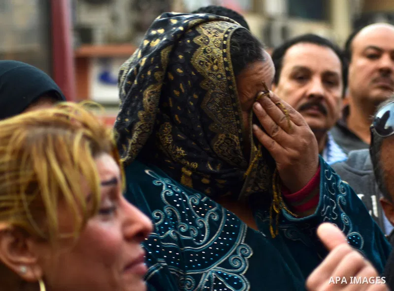 A relative of one of the Egyptian Coptic men killed in Libya reacts during a demonstration to denounce the killing of Egyptian Christians in Libya, in Cairo,16 February 2015. An Islamic State video released on 15 Februar...