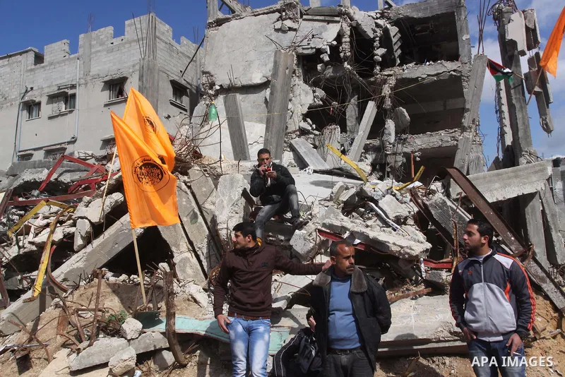Palestinian owners of houses which were destroyed during the recent Israeli war, take part in a rally demanding for reconstruction of their houses, in Shejaiya neighborhood in Gaza city, February 17, 2015. At least 100,0...