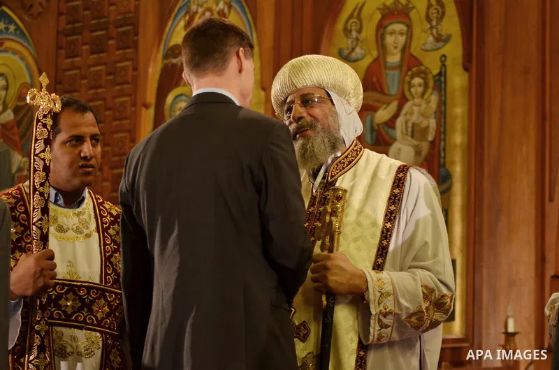 Egypt's Coptic Pope Tawadros II recieves condolences following a mass to honor the memory of the Egyptian Coptic Christians murdered by Islamic State (IS) group militants in Libya, at Saint-Mark's Coptic Cathedral in Cai...