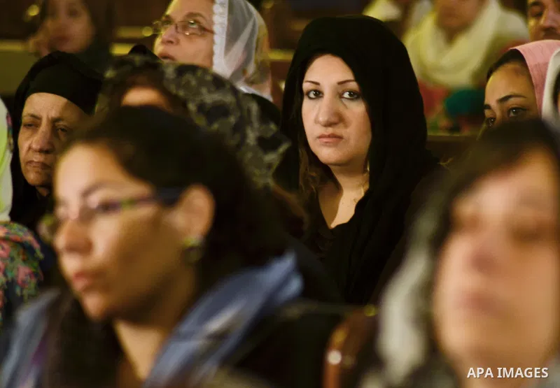 Egyptian Coptics attend a mass led by Egypt's Coptic Pope Tawadros II to honor the memory of the Egyptian Coptic Christians murdered by Islamic State (IS) group militants in Libya, at Saint-Mark's Coptic Cathedral in Cai...