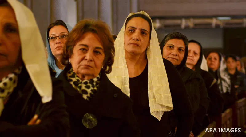Egyptian Coptics attend a mass led by Egypt's Coptic Pope Tawadros II to honor the memory of the Egyptian Coptic Christians murdered by Islamic State (IS) group militants in Libya, at Saint-Mark's Coptic Cathedral in Cai...