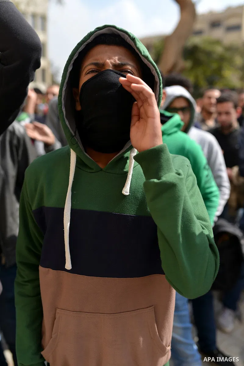 An Egyptian student who support ousted President Mohamed Morsi and the Muslim Brotherhood shouts slogans during protest against the military rule, in Cairo University on February 18, 2015. Due to the escalation of studen...