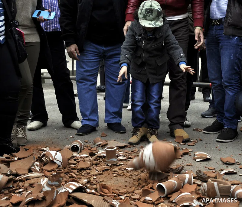 Egyptians take part during a protest in front of the Qatari embassy during a demonstration in Cairo, Egypt, 21 February 2015. Several people protested outside Qatar's embassy, after Qatar received backing a few days earl...