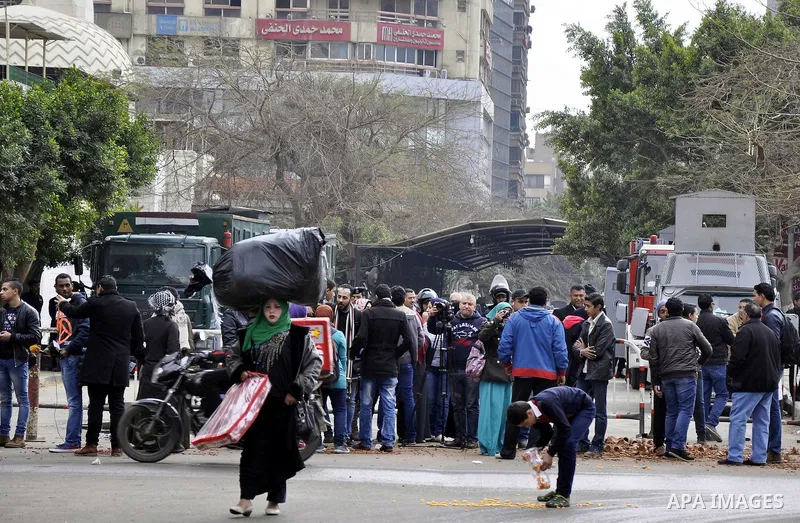 Egyptians take part during a protest in front of the Qatari embassy during a demonstration in Cairo, Egypt, 21 February 2015. Several people protested outside Qatar's embassy, after Qatar received backing a few days earl...