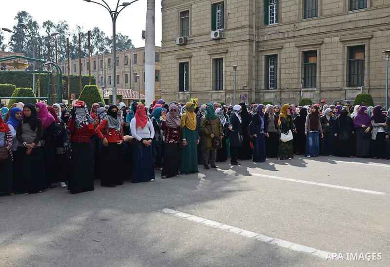 Egyptian students who are support ousted President Mohamed Morsi and the Muslim Brotherhood shout slogans during protest against the military rule, in Cairo University on February 22, 2015. Due to the escalation of stude...