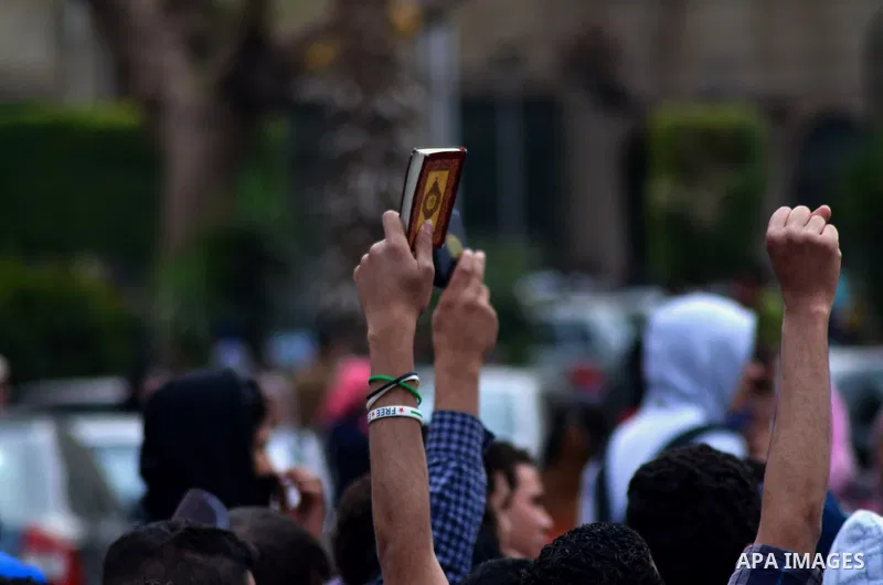 Egyptian students who are support ousted President Mohamed Morsi and the Muslim Brotherhood shout slogans during protest against the military rule, in Cairo University on February 22, 2015. Due to the escalation of stude...