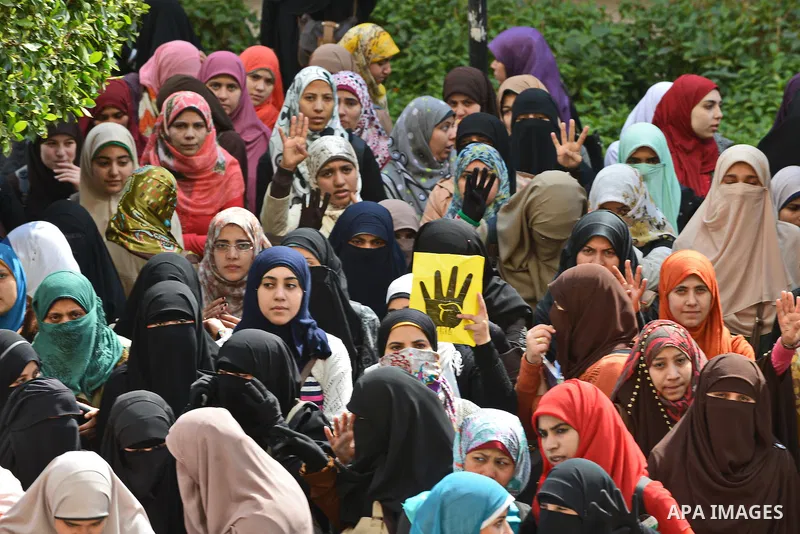 Egyptian students who are support ousted President Mohamed Morsi and the Muslim Brotherhood shout slogans during protest against the military rule, in Cairo University on February 22, 2015. Due to the escalation of stude...