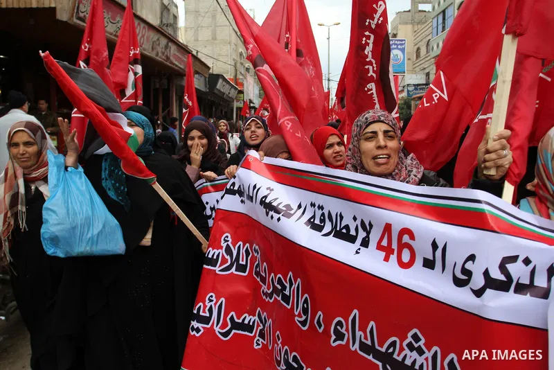Palestinian women chant slogans during a rally marking the 46th anniversary of the founding of the Democratic Front for the Liberation of Palestine (DFLP), in Rafah in the southern Gaza Strip February 23, 2015. Photo by...