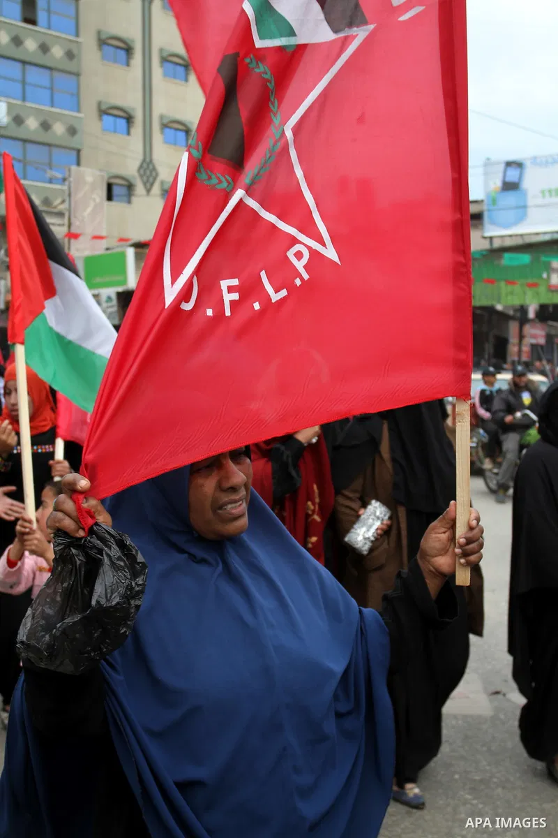 A Palestinian woman chants slogans during a rally marking the 46th anniversary of the founding of the Democratic Front for the Liberation of Palestine (DFLP), in Rafah in the southern Gaza Strip February 23, 2015. Photo...