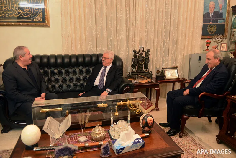 Palestinian President, Mahmoud Abbas (Abu Mazen) meets with Jordanian Foreign Minister Nasser Judeh in Amman, on February 24, 2015. Photo by Thaer Ganaim