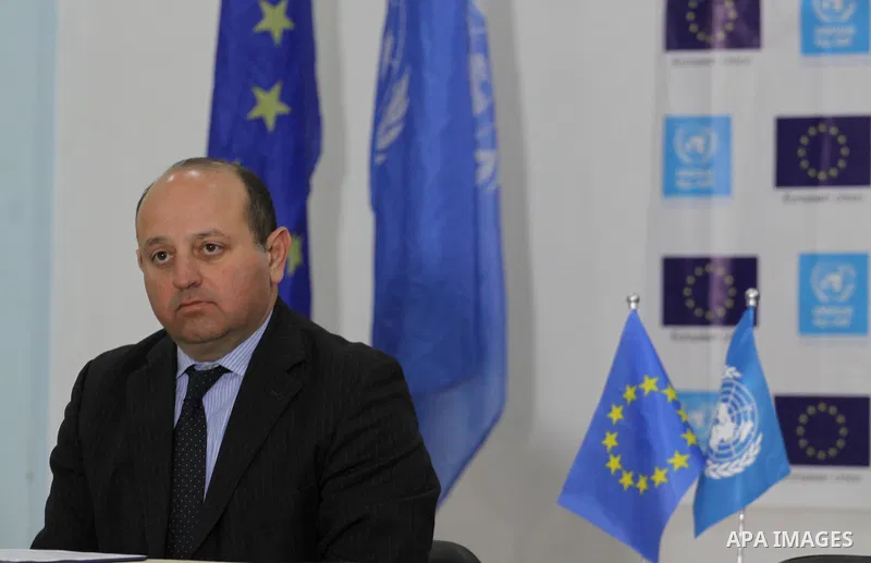 European Union representative John Gatt-Rutter, attends the signing an agreement with Director of UNRWA operations, Robert Turner (not seen), in Gaza city on February 24, 2015. The European Union (EU) has announced a new...