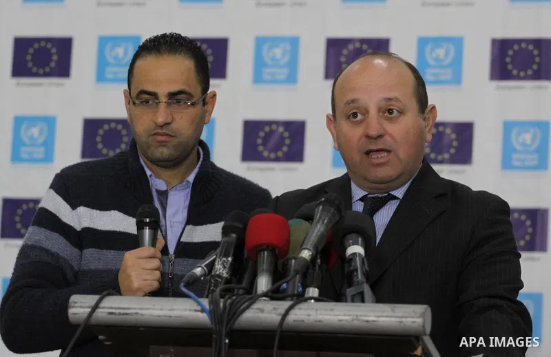 European Union representative John Gatt-Rutter, attends the signing an agreement with Director of UNRWA operations, Robert Turner (not seen), in Gaza city on February 24, 2015. The European Union (EU) has announced a new...