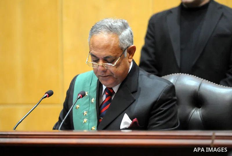 The Judge speaks during the retrial of Former Egyptian premier Ahmed Nazif and former interior minister Habib al-Adly in a court, in Cairo, Egypt, 24 February 2015. Cairo Criminal Court acquitted former premier Ahmed Naz...