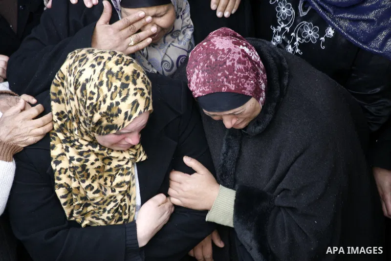 Relatives mourn during the funeral of 19-year old Palestinian Jihad al-Jaafari, who was shot dead on the roof of his house after Israeli soldiers entered the Dheishe refugee camp, near the West Bank city of Bethlehem bef...