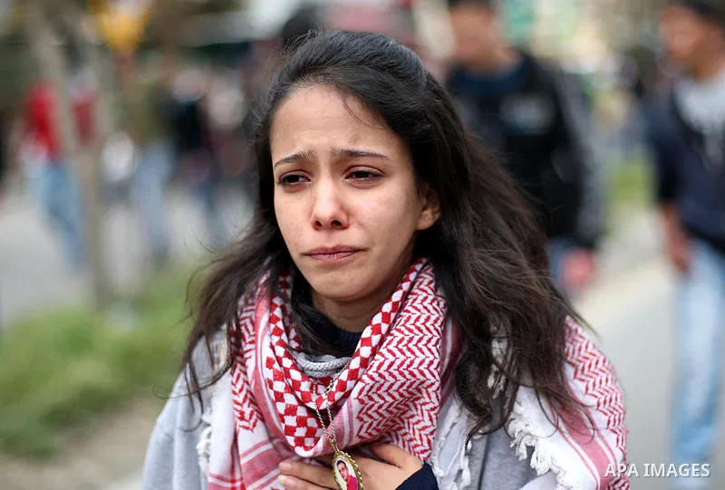 A relative mourns during the funeral of 19-year old Palestinian Jihad al-Jaafari, who was shot dead on the roof of his house after Israeli soldiers entered the Dheishe refugee camp, near the West Bank city of Bethlehem b...