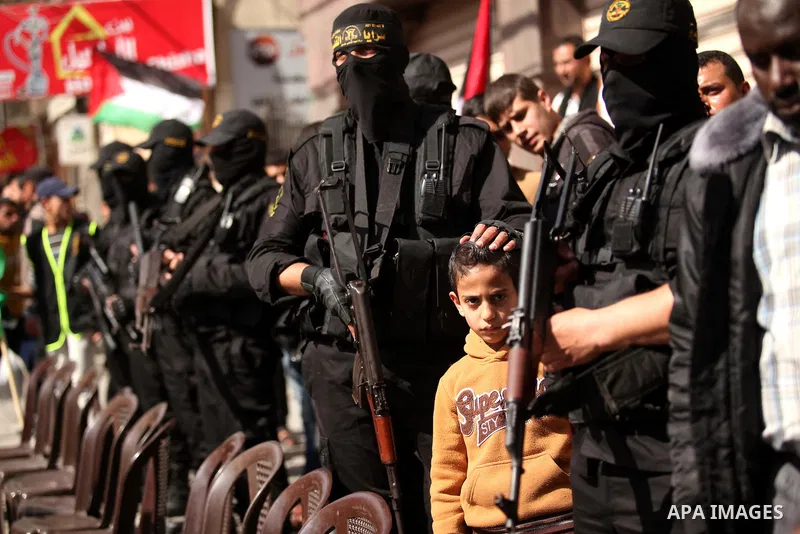 Palestinian militants of Islamic Jihad movement take part in a rally in support of Palestinian prisoners in Israeli jails, in Gaza city on February 27, 2015. Israel has enforced severe measures against the Palestinian Is...