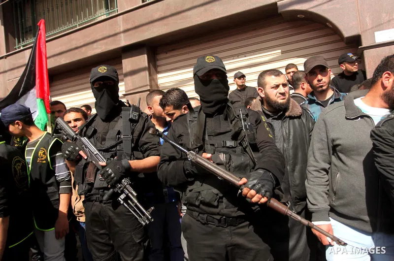 Palestinian militants of Islamic Jihad movement take part in a rally in support of Palestinian prisoners in Israeli jails, in Gaza city on February 27, 2015. Israel has enforced severe measures against the Palestinian Is...