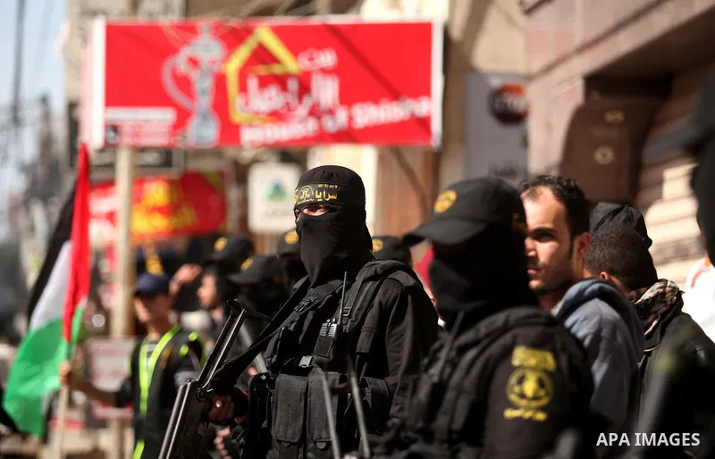 Palestinian militants of Islamic Jihad movement take part in a rally in support of Palestinian prisoners in Israeli jails, in Gaza city on February 27, 2015. Israel has enforced severe measures against the Palestinian Is...