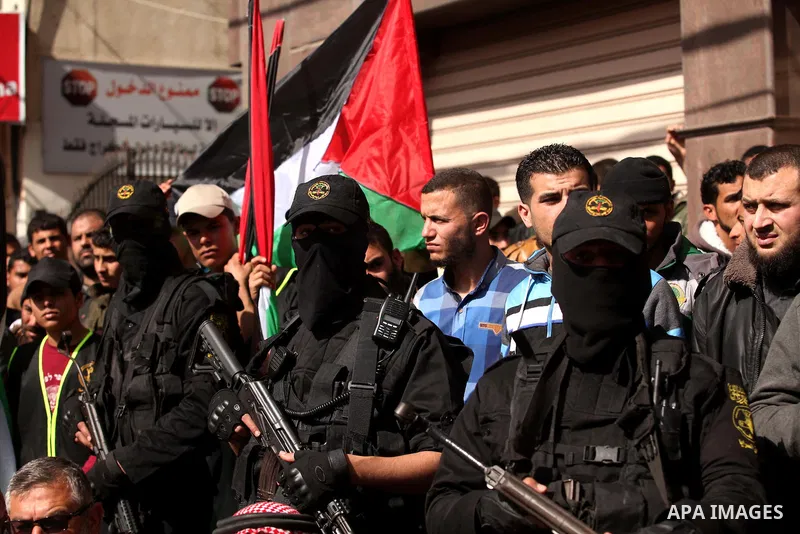 Palestinian militants of Islamic Jihad movement take part in a rally in support of Palestinian prisoners in Israeli jails, in Gaza city on February 27, 2015. Israel has enforced severe measures against the Palestinian Is...