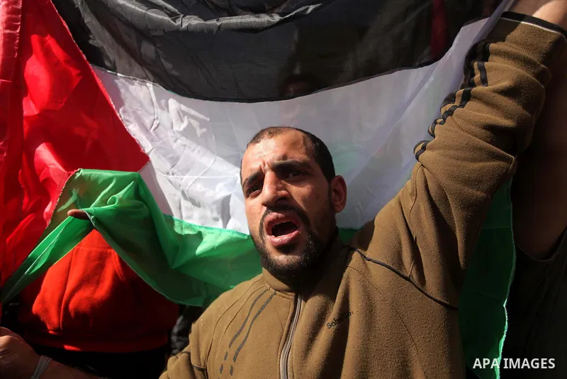 A Palestinian supporter of Islamic Jihad movement, chants during a rally in support of Palestinian prisoners in Israeli jails, in Gaza city on February 27, 2015. Israel has enforced severe measures against the Palestinia...