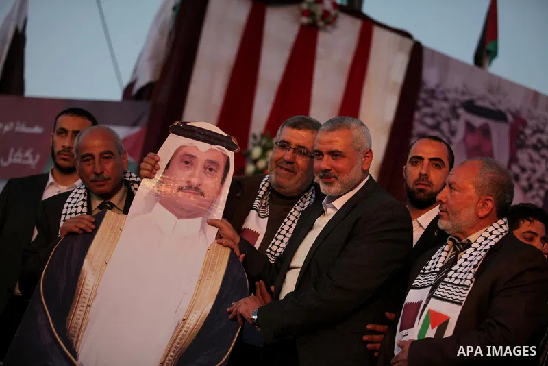 Senior Hamas leader Ismail Haniyeh, attends a mass wedding ceremony in Gaza City, February 27, 2015. 50 couples took part in the a mass wedding aided by Qatar. Photo by Ashraf Amra
