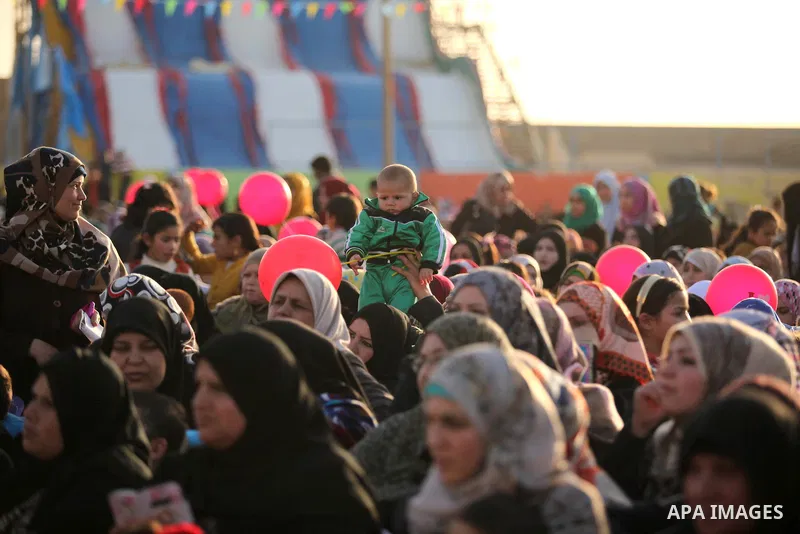 Palestinians attend a mass wedding ceremony in Gaza City, February 27, 2015. 50 couples took part in the a mass wedding aided by Qatar. Photo by Ashraf Amra