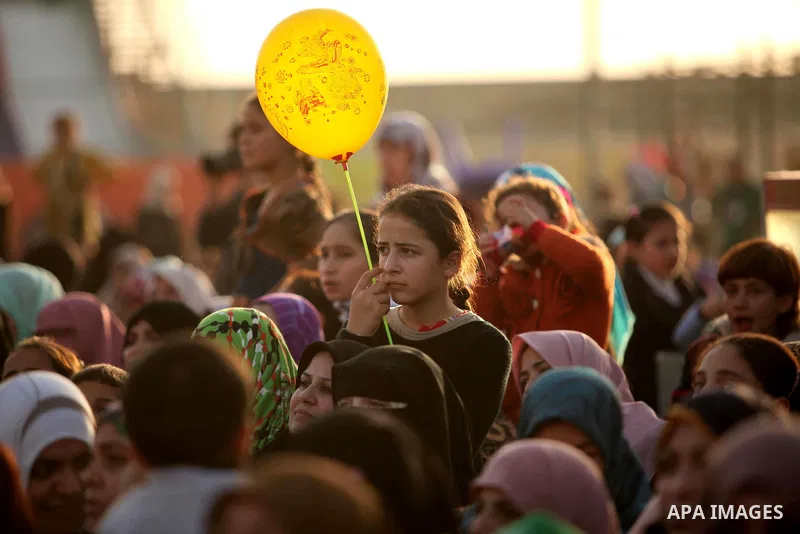 Palestinians attend a mass wedding ceremony in Gaza City, February 27, 2015. 50 couples took part in the a mass wedding aided by Qatar. Photo by Ashraf Amra