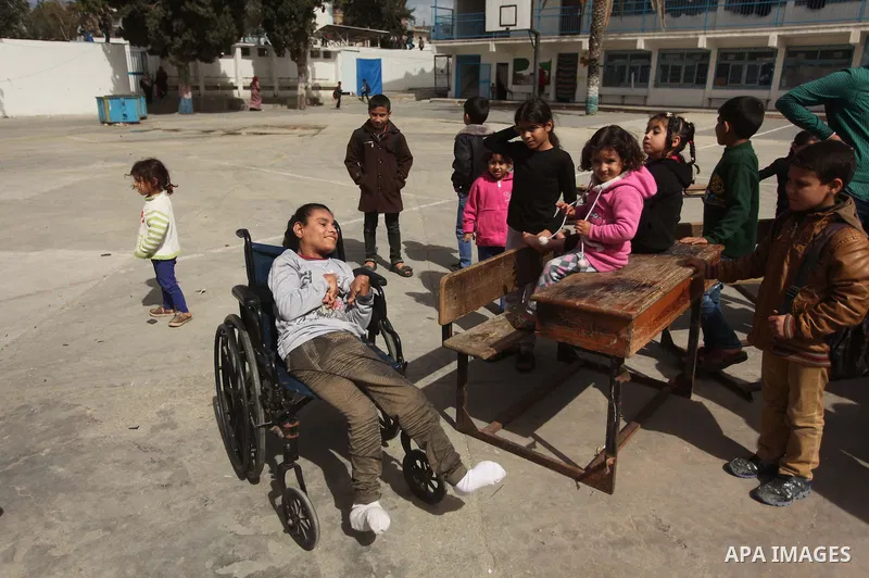 Displaced Palestinians take shelter at Beit Hanoun School in the northern Gaza Strip February 28, 2015. More than 100,000 homes in the Gaza Strip were damaged or destroyed in Israeli bombardment during the 50-day conflic...