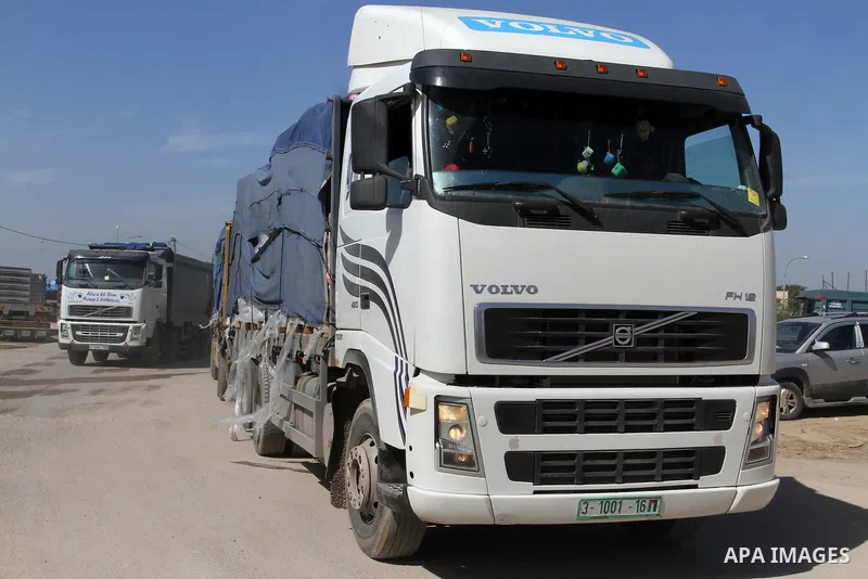 A truck loaded with cement enters the Gaza Strip from Israel through the Kerem Shalom crossing in Rafah in southern Gaza Strip, in Rafah in the southern Gaza Strip on February 28, 2015. Photo by Abed Rahim Khatib