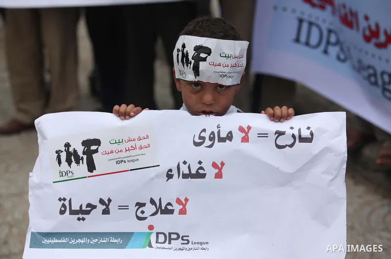 Palestinian owners of houses which were destroyed during the recent Israeli war, take part in a rally demanding for reconstruction of their houses, in Gaza city, on March 04, 2015. At least 100,000 Palestinians are still...