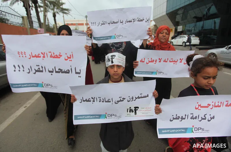 Palestinian owners of houses which were destroyed during the recent Israeli war, take part in a rally demanding for reconstruction of their houses, in Gaza city, on March 04, 2015. At least 100,000 Palestinians are still...