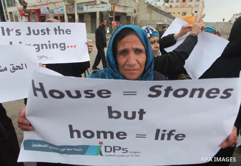 Palestinian owners of houses which were destroyed during the recent Israeli war, take part in a rally demanding for reconstruction of their houses, in Gaza city, on March 04, 2015. At least 100,000 Palestinians are still...
