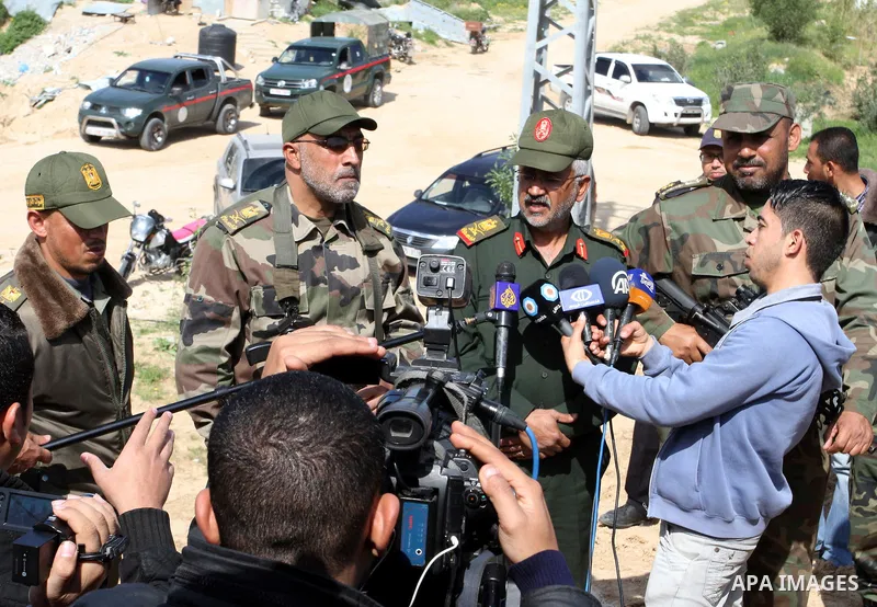 Palestinian National Security Forces commander Hussain Abu Athra, speaks to media as he inspects the border between Egypt and southern Gaza Strip, in Rafah on March 5, 2015. Gaza's border crossings will be reopened once...